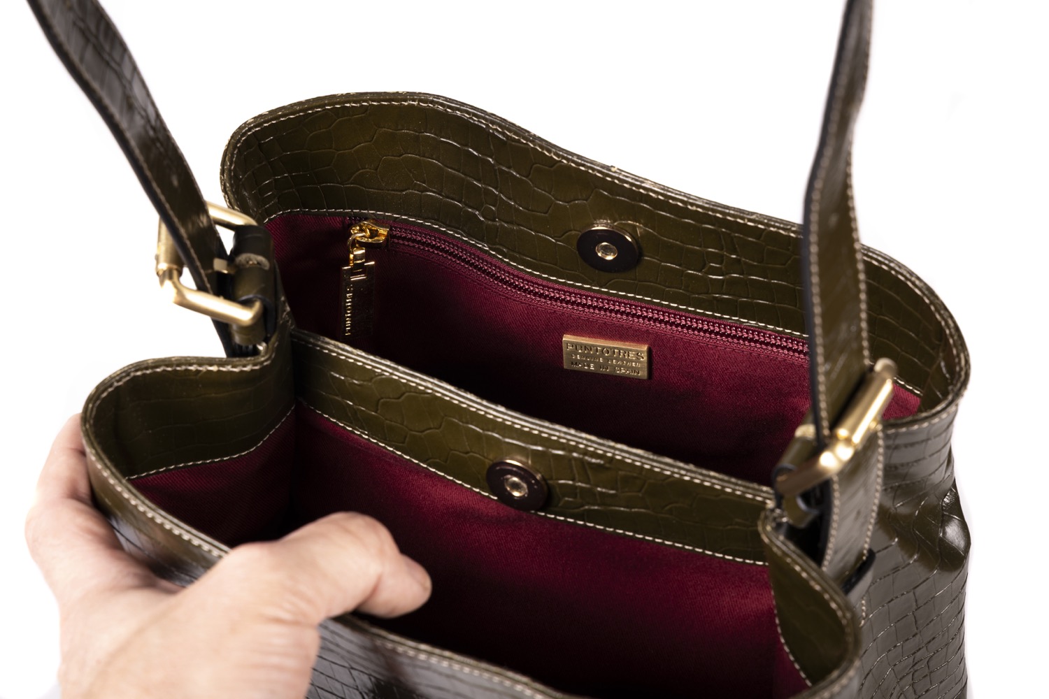 Bolso de piel con asa extensible